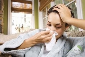 a photo of a sick or allergic woman with a tissue